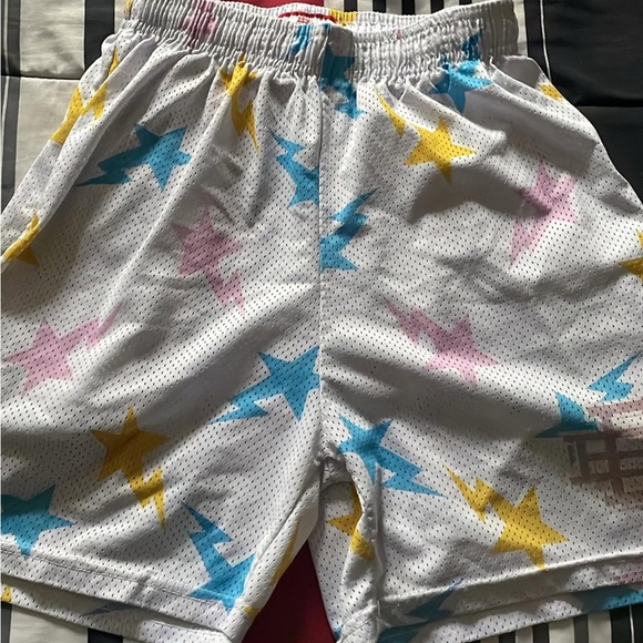 Eric Emanuel BAPE White Shorts with Blue, Pink, and Yellow Stars